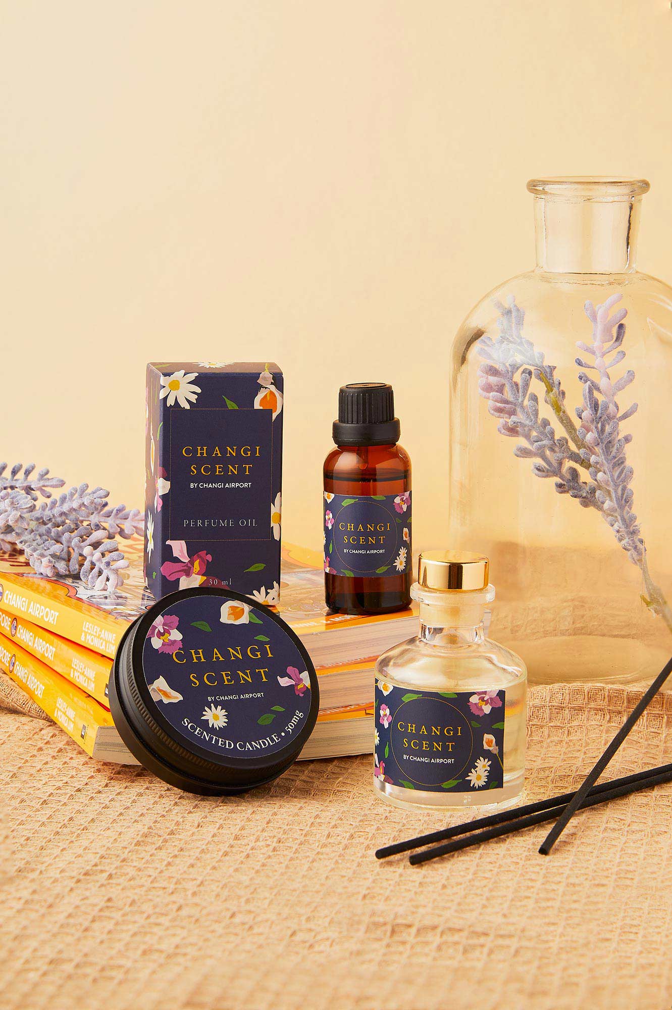 flatlay product photography - scented candle, diffuser, perfume oil - Mount Studio