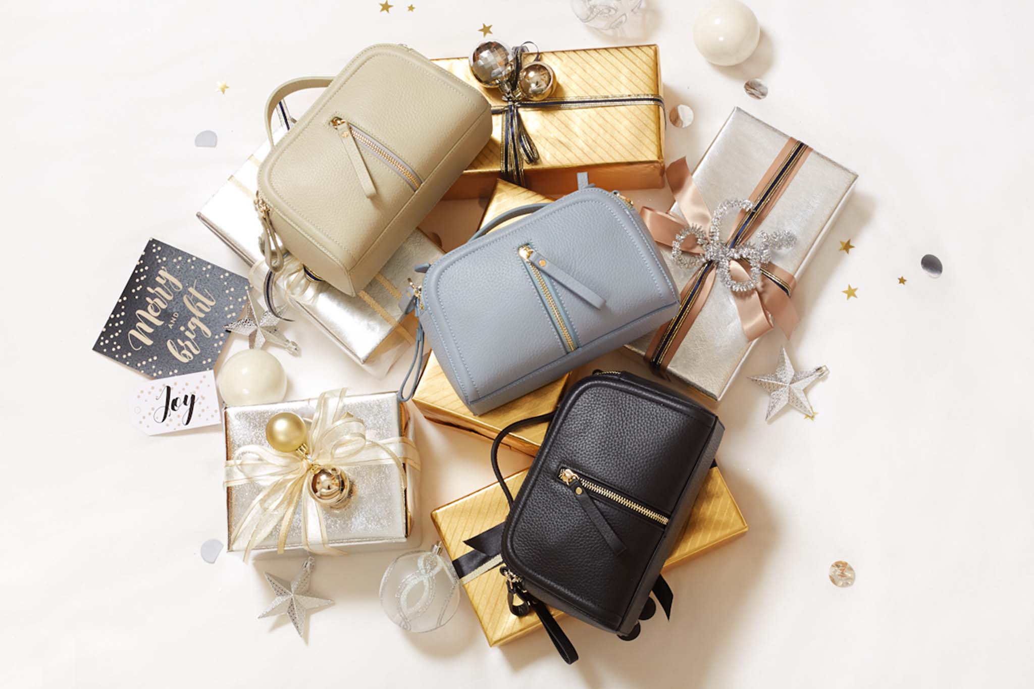 Flatlay product photography - 3 bags on a pile of present, Christmas photoshoot - Mount Studio