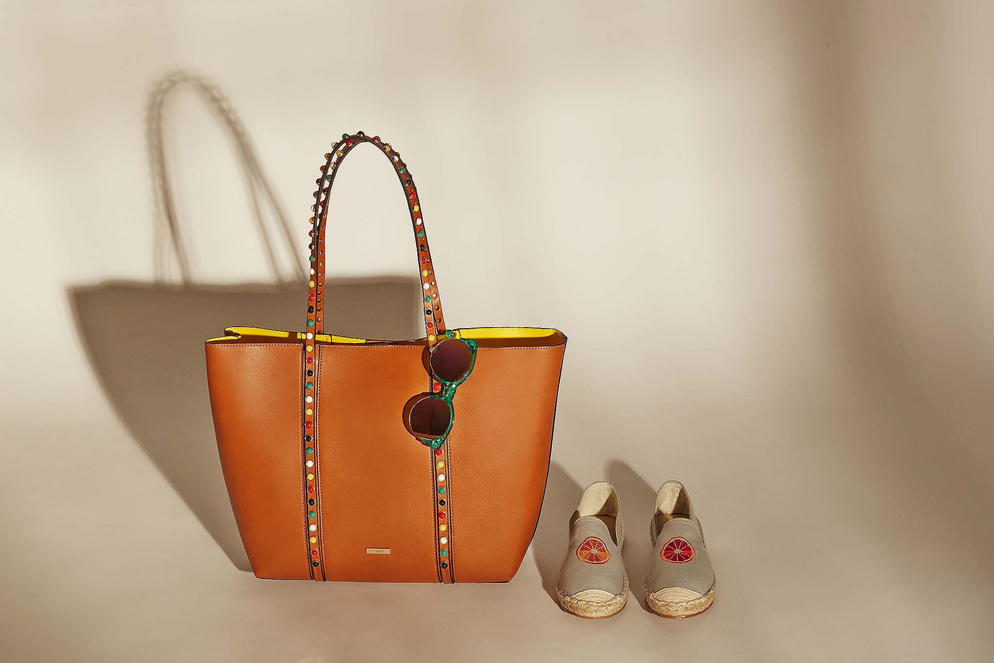 Styled product photography - brown tote bag with a pair of soles - Mount Studio